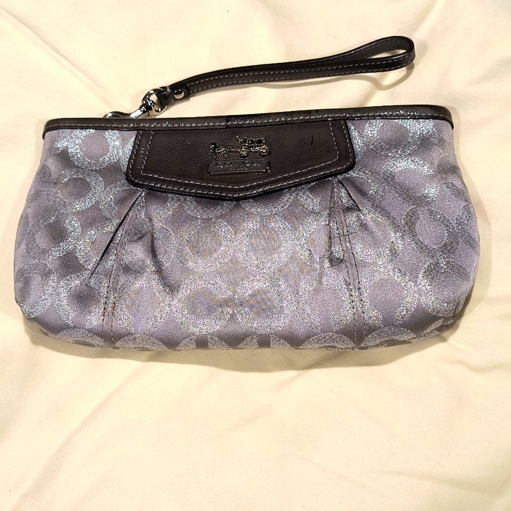 Coach Wristlet, callouts of color transfer as pictured